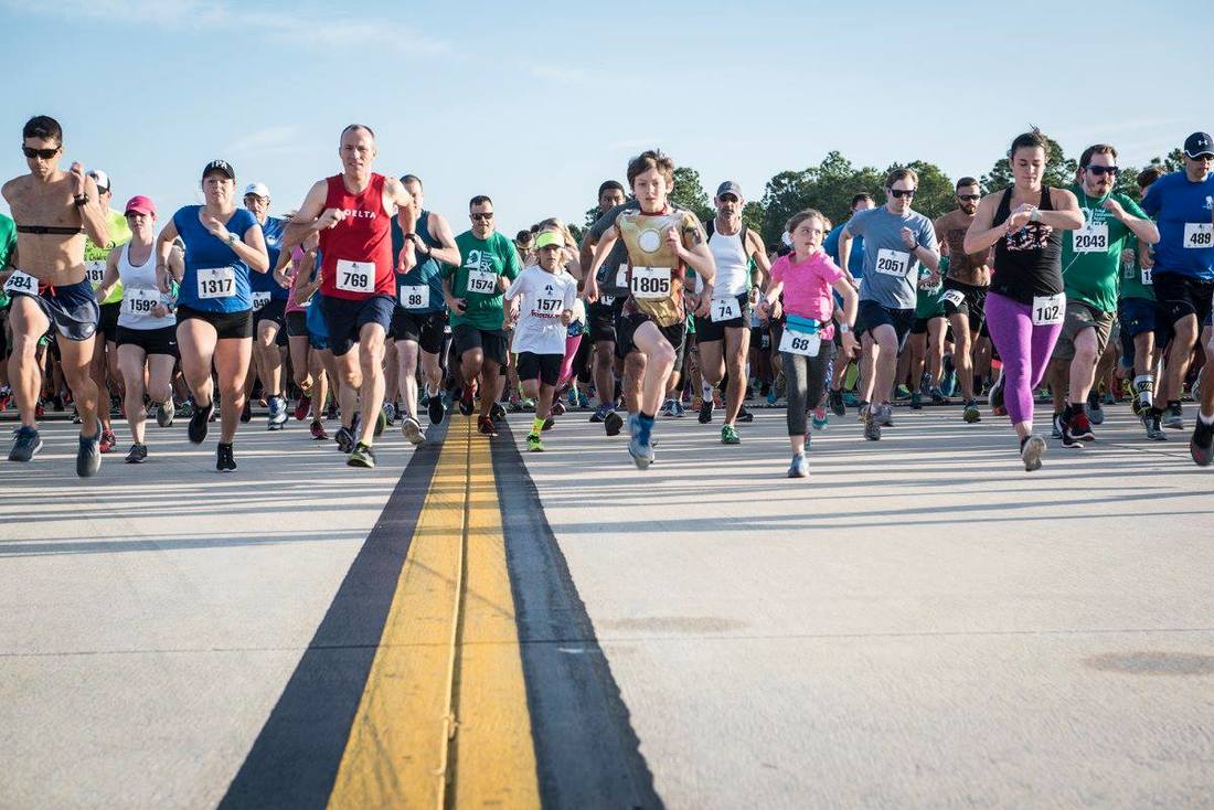 Runners start the 5K on the Runway at Tampa International Airport.