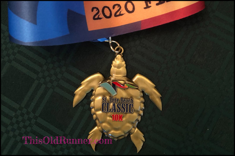 10K medal shaped like a turtle from the St Pete Beach Classic race.