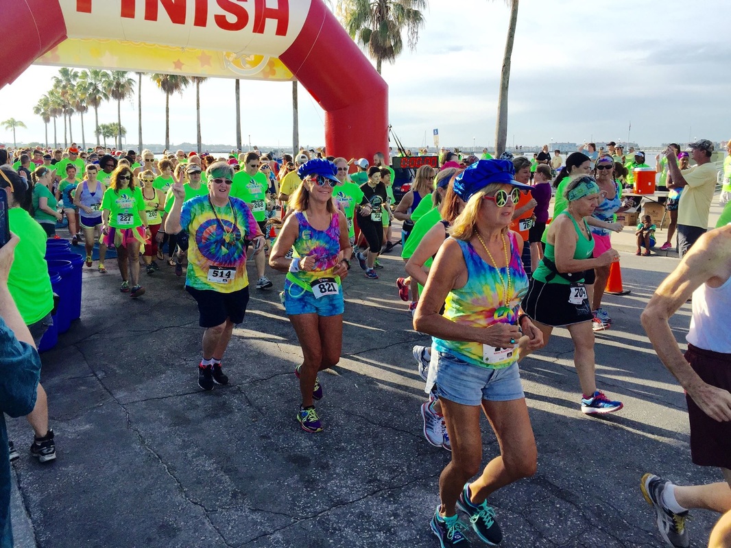 Picture of runners in the Hippie Dash 5k in Gulfport, FL.
