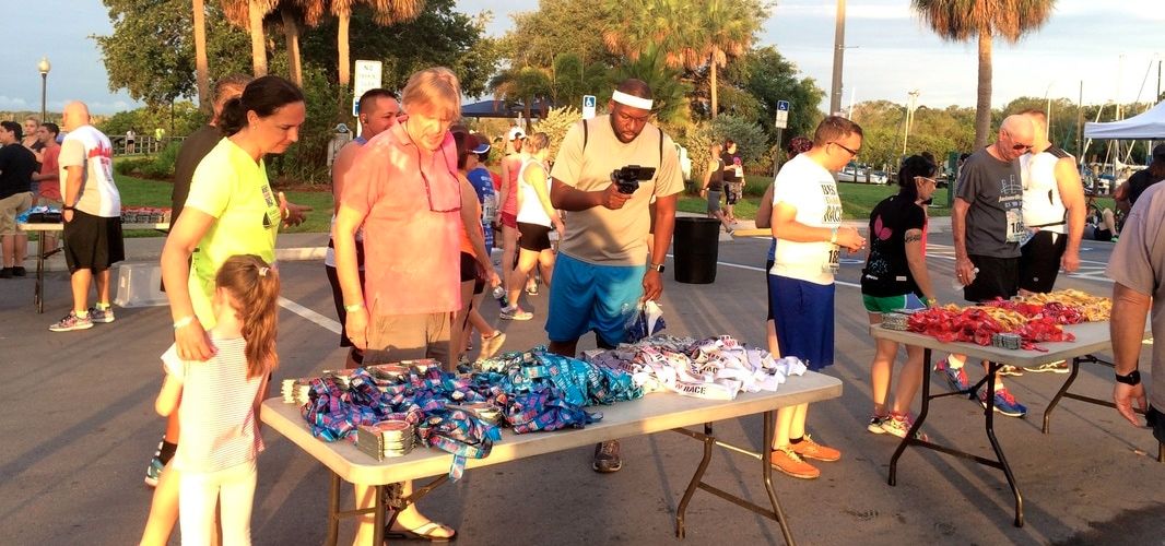 Assorted medals were displayed on tables for the Best Damn Race Leftover 5K Race.