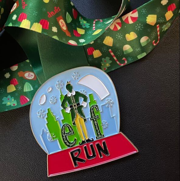 Elf Virtual Run finishers medal.