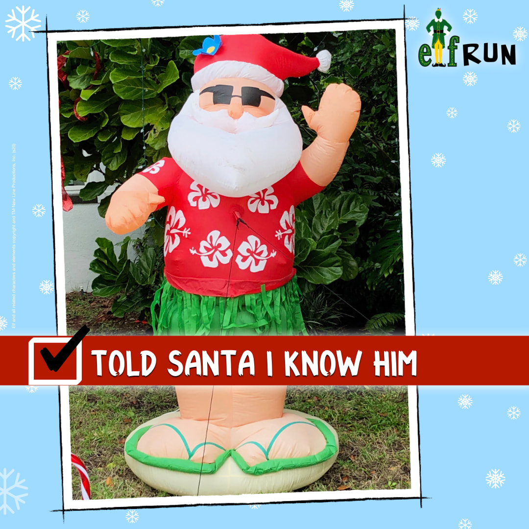 Inflatable Santa in Hawaiian shirt and flip flops.
