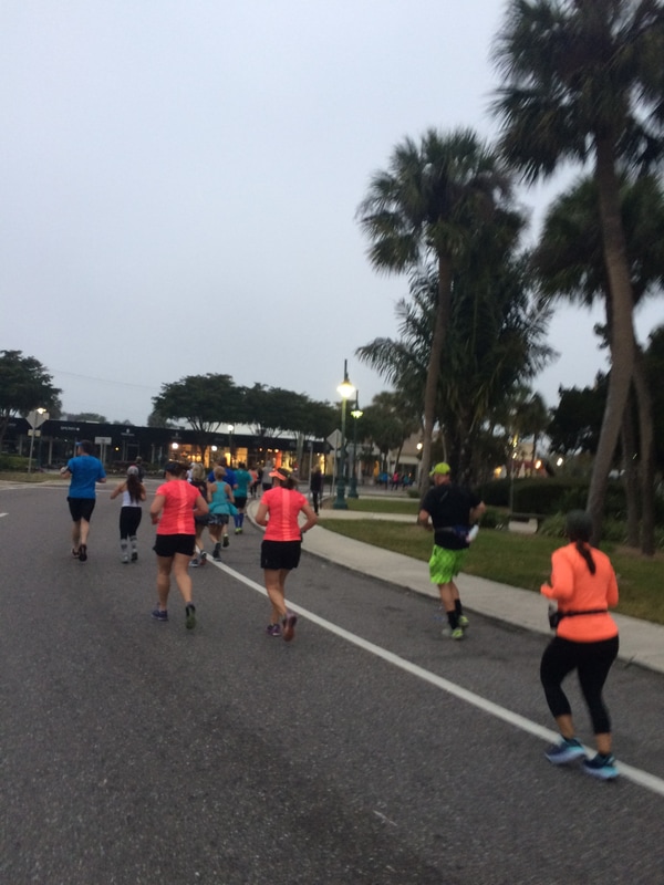 Runners in the Sarasota Music Half on St. Armands Circle.
