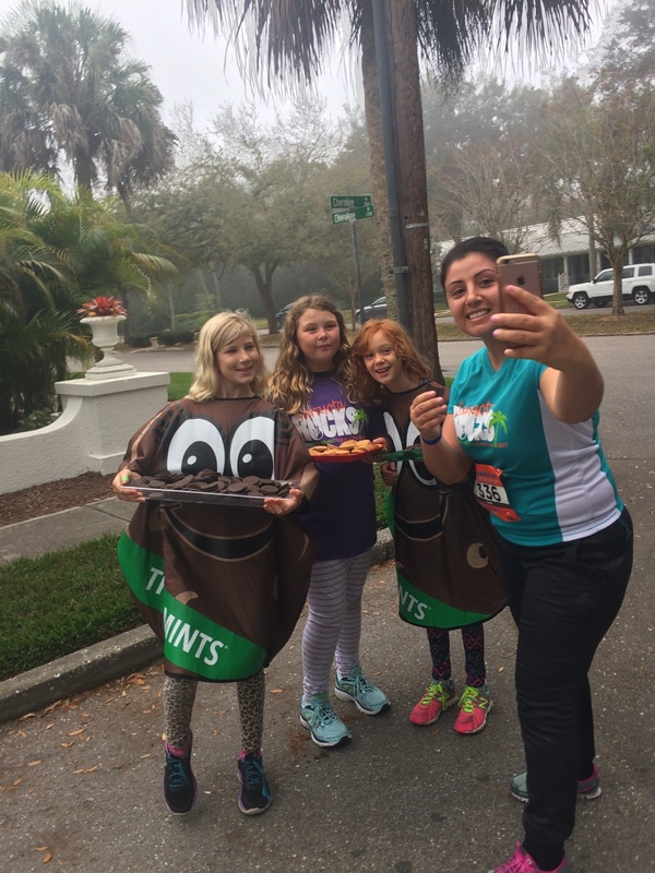 Girl Scouts served cookies and posed for selfies during the 2017 Sarasota Music Half Marathon.